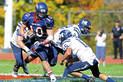 JP Holtz carries the ball against Erie McDowell in October 2011