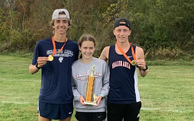 Tyler Paszkowski, Sam Hennen and Ryan Parris at the TSTCA Cross Country Championship Meet at California University of PA