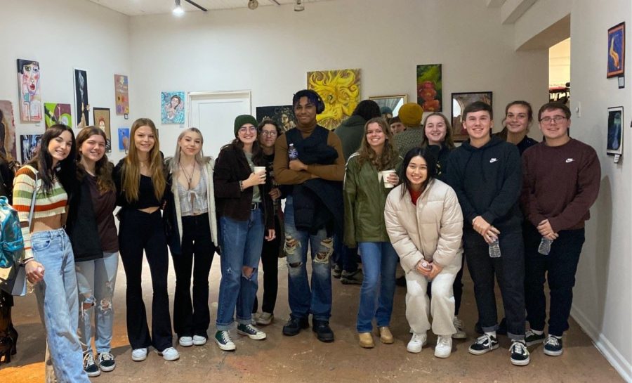 AP+art+and+jewelry+students+attending+their+art+showcase+at+the+Panza+Gallery.