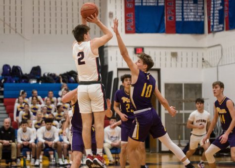 Keegan Smetanka takes a jump shot against Plum. 