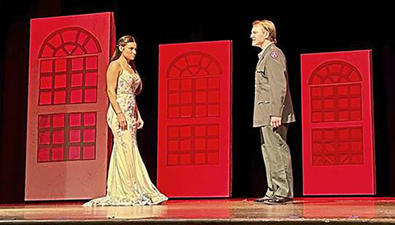 Malia Podgorski and Max Milligan rehearse a scene from Anastasia. 
