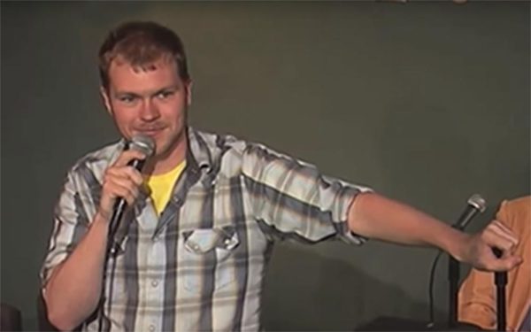 Kenny Zimlinghaus performing stand-up comedy.
