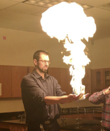 Mr. Foster showing the Elementary students fun science. 