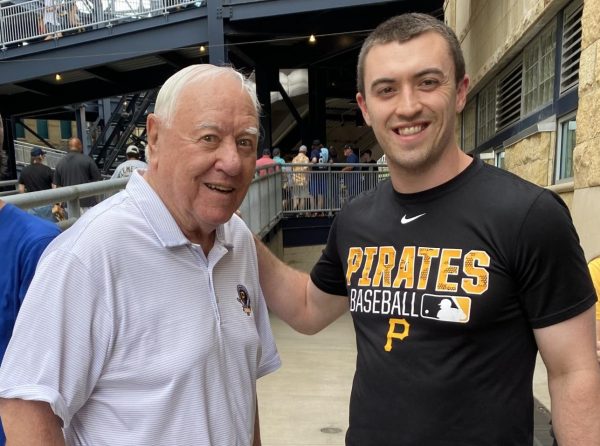 Mr. Keegan Phillips stands with Pirates legend Bill Mazeroski
