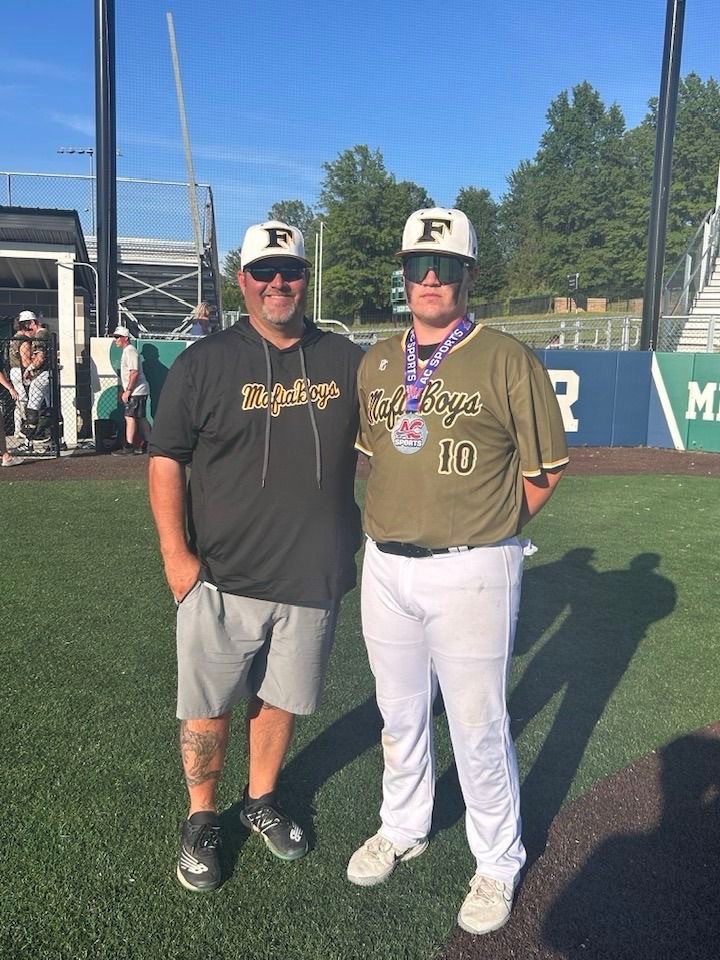 Mr. Ben Yeckel poses with oldest son Ben Yeckel Jr.