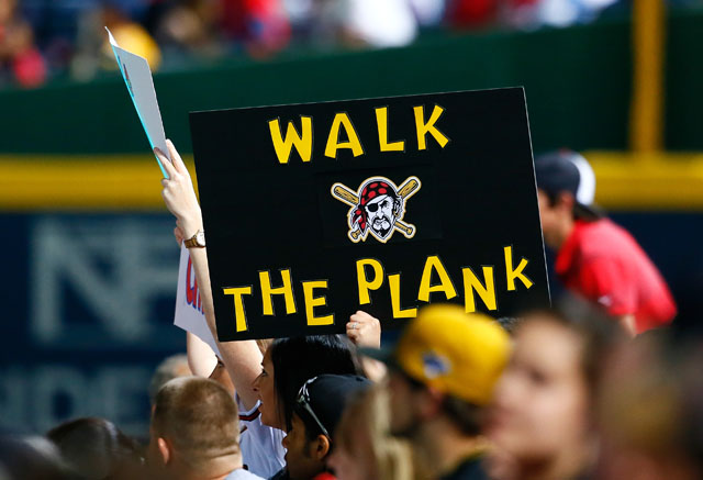 Fans hold up a "Walk The Plank" sign (Kevin C. Cox/Getty Images)