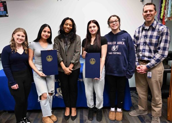 Two of the There Ought to Be a Law Winners Gabriela Navas (2ndfrom the left) and Paityn Greygor (3rd from the right) with State Representative Lindsay Powell (between Navas and Greygor)